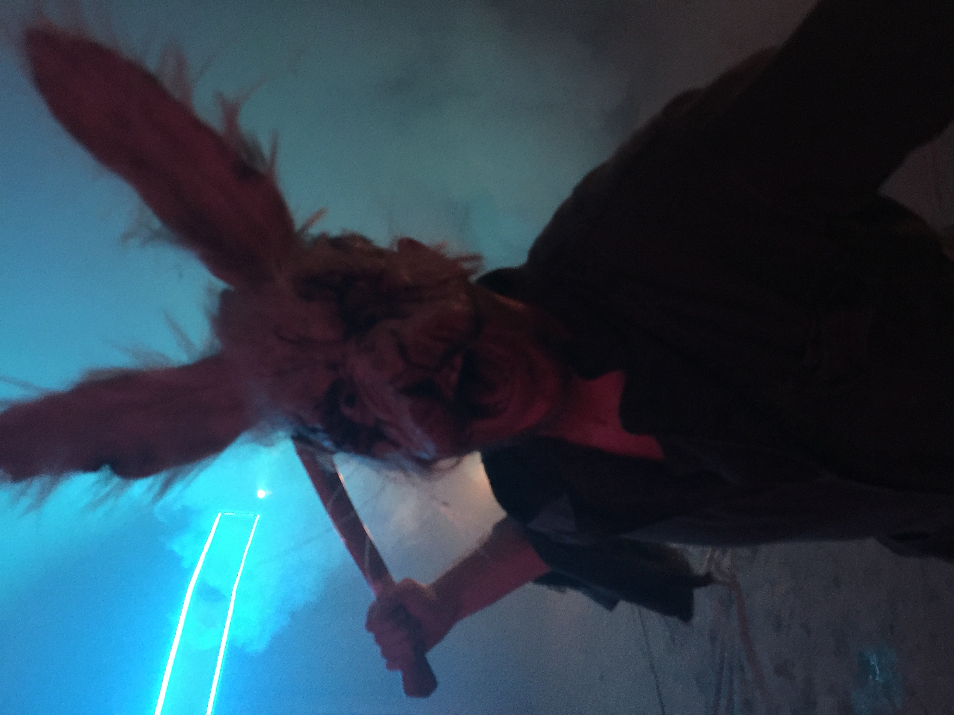 Bad Bunny - Halloween scare actor with a hammer screaming.